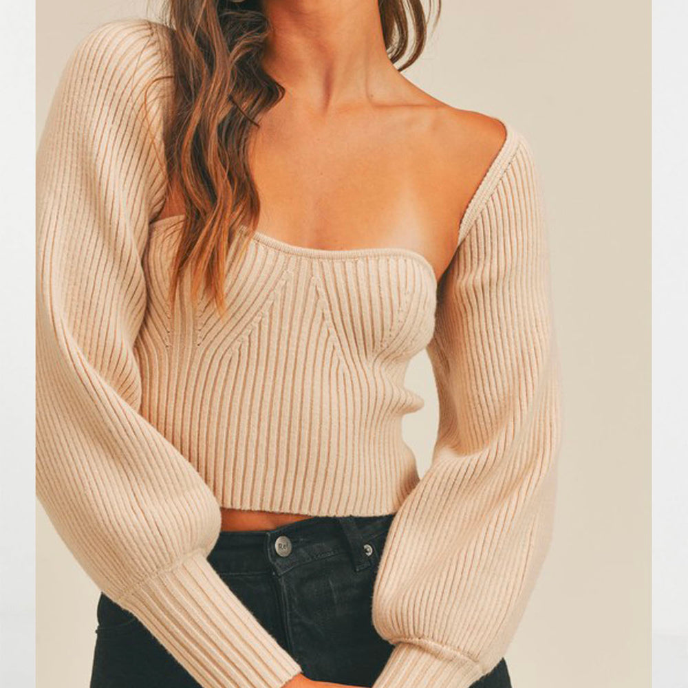 
                  
                    Top y Sueter Nude
                  
                